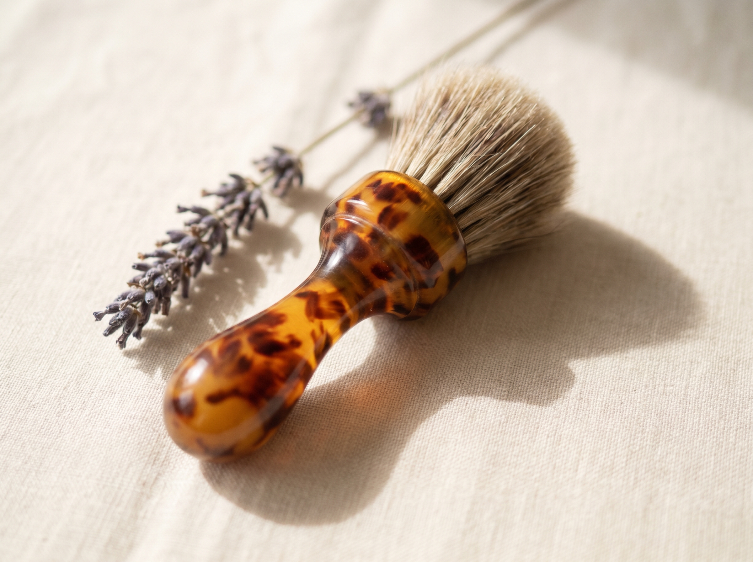 A tortoiseshell apothecary brush evoking hair restoration at Aesura.